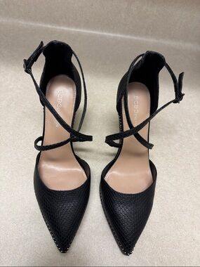 BCBGeneration Black Pointed Toe Crisscross Ankle Strap Heels